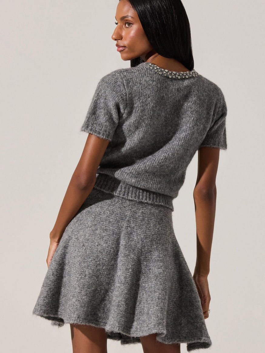 Back view of grey short sleeve knit top and skirt set