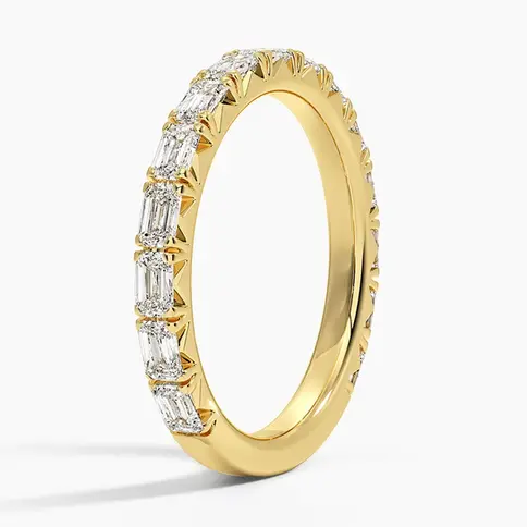 Elegant yellow gold eternity band featuring radiant emerald-cut diamonds