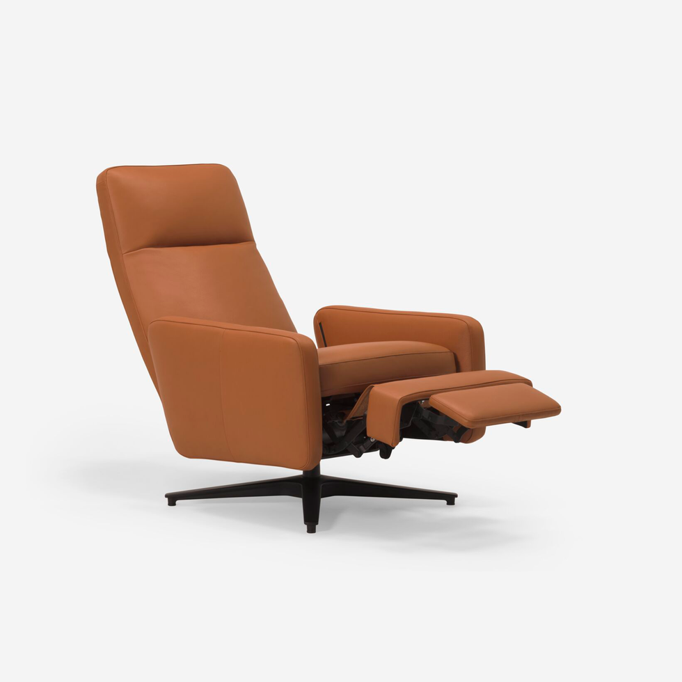 Relaxed burnt-orange leather recliner chair