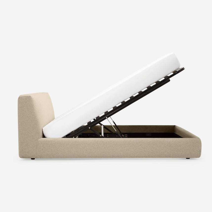 Beige upholstered bed with lift-up mattress