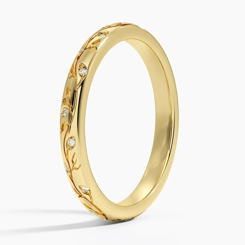 Gold eternity ring with floral vine and diamond accents