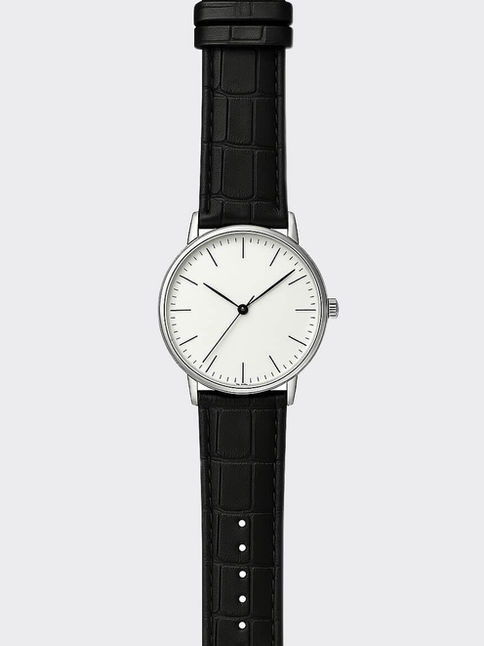 Vintage-inspired watch with silver case and black strap