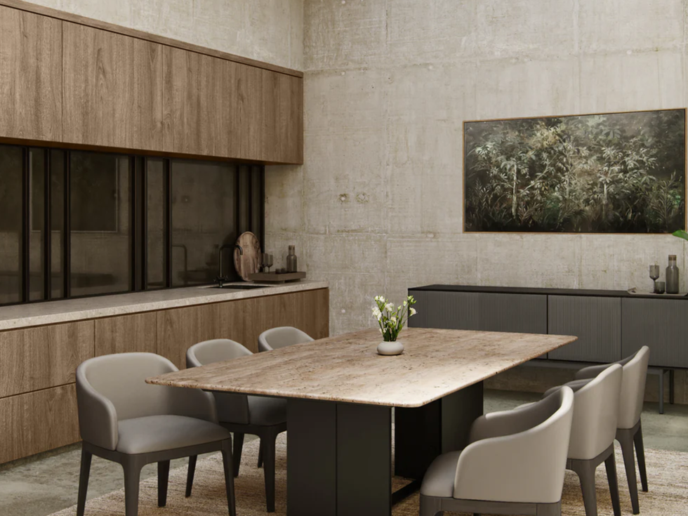 Modern dining room setup with a wooden table and gray chairs.