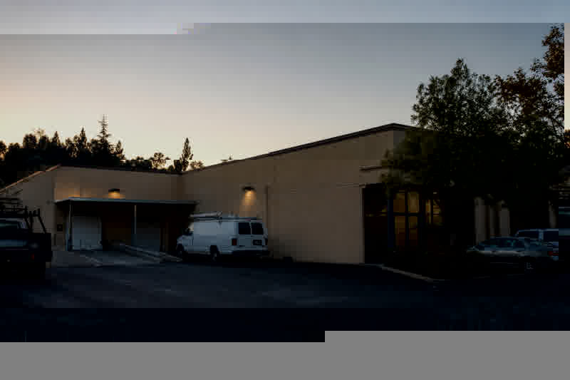 Commercial parking lot and loading dock at dusk
