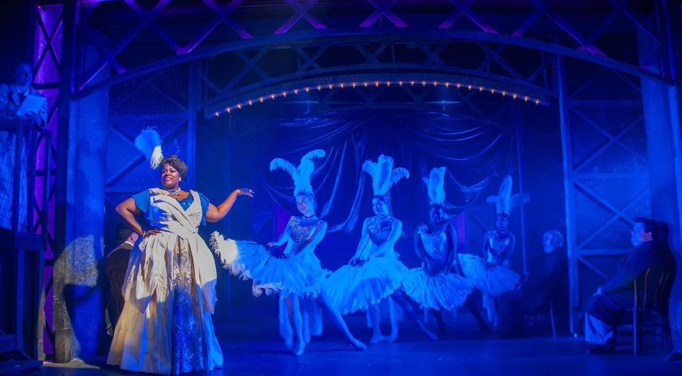 Brandi Chavonne Massey (Medda Larkin) and the Bowry Beauties in Disney's Newsies
Photo: Danny Sze