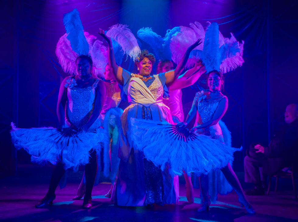 Brandi Chavonne Massey (Medda Larkin) and the Bowry Beauties in Disney's Newsies
Photo: Danny Sze