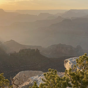 Sunset over the mists of Grand Canyon