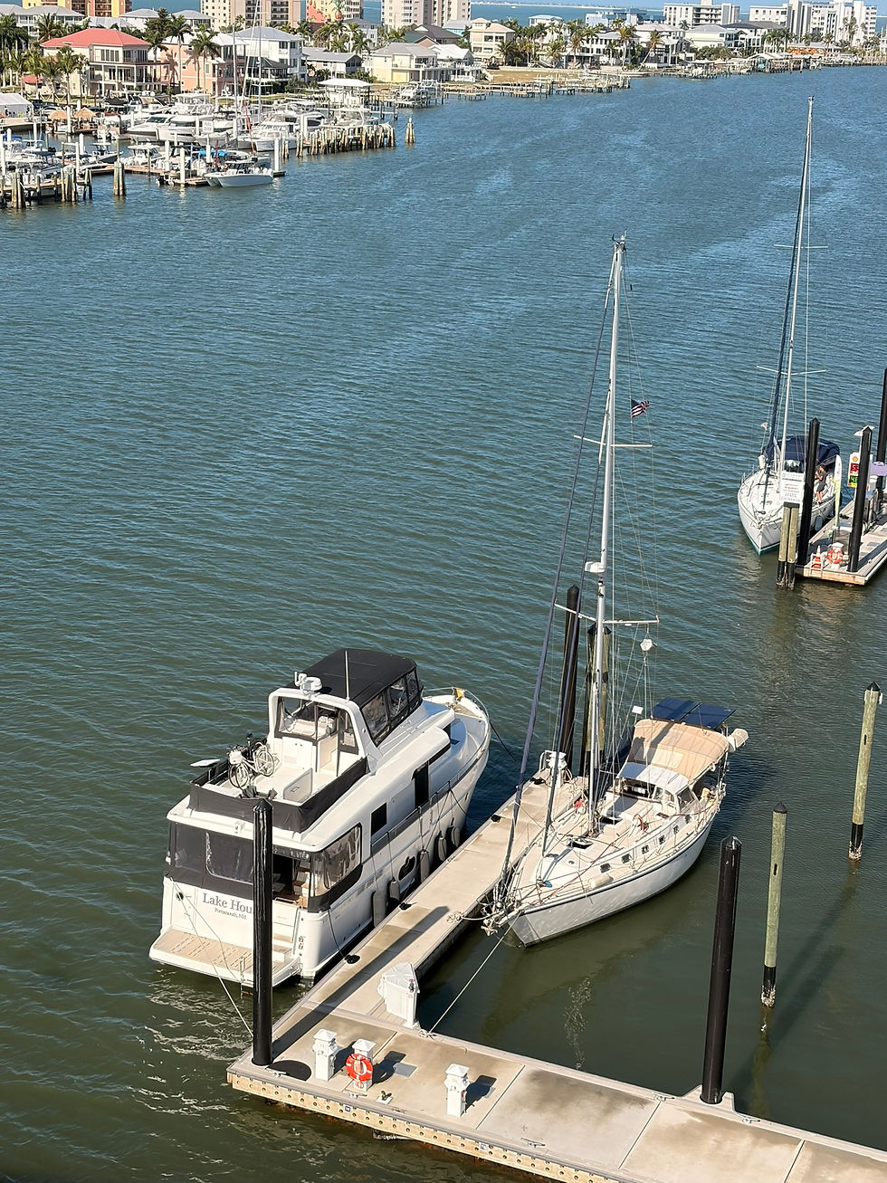 Tiny Utopia in a huge slip from the bridge.