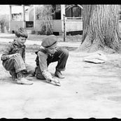 Kids playing marbles