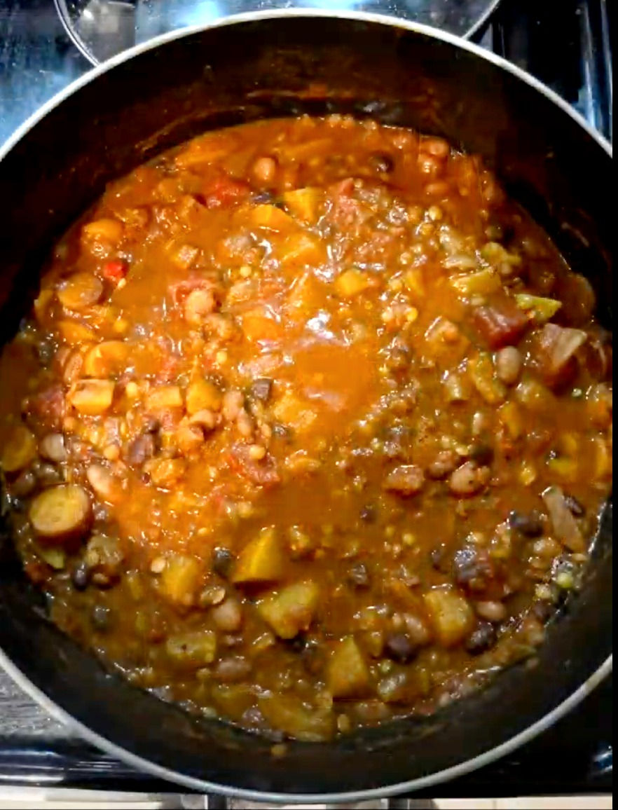 large pot filled with vegetarian chili with pumpkin