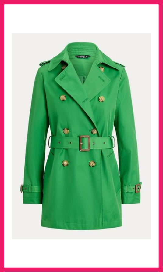 A bright true green double-breasted trench coat, perfect for building a capsule wardrobe with