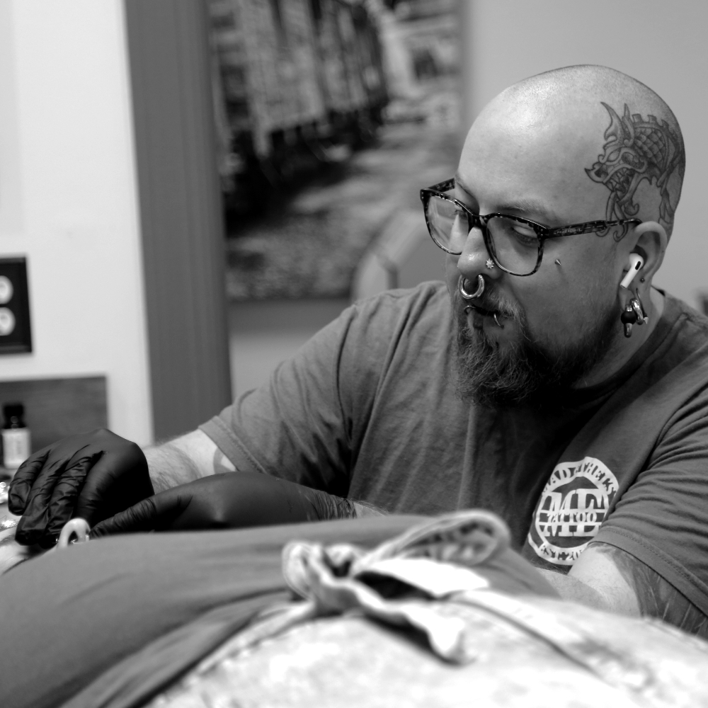 Justin Koce, resident piercer at Mad Ethel’s Tattoo in Downtown Raleigh