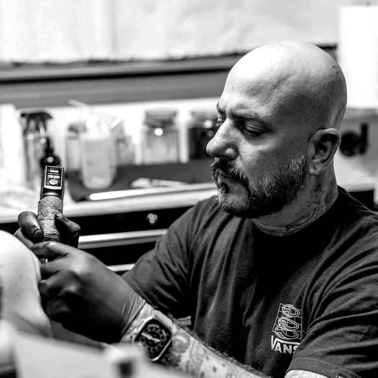 Portrait of Jet Tamburri, tattoo artist at Mad Ethel's Tattoo in Raleigh, NC