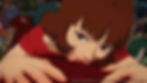 Close-up of girl, lying on her bed, looking directly into the camera. Taken from the anime film Paprika (2006) by Satoshi Kon.
