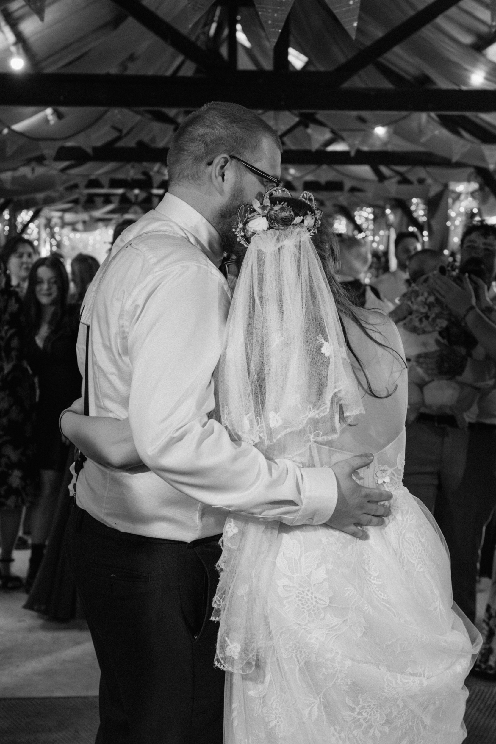 Portrait of the bride and groom in each other's arms
