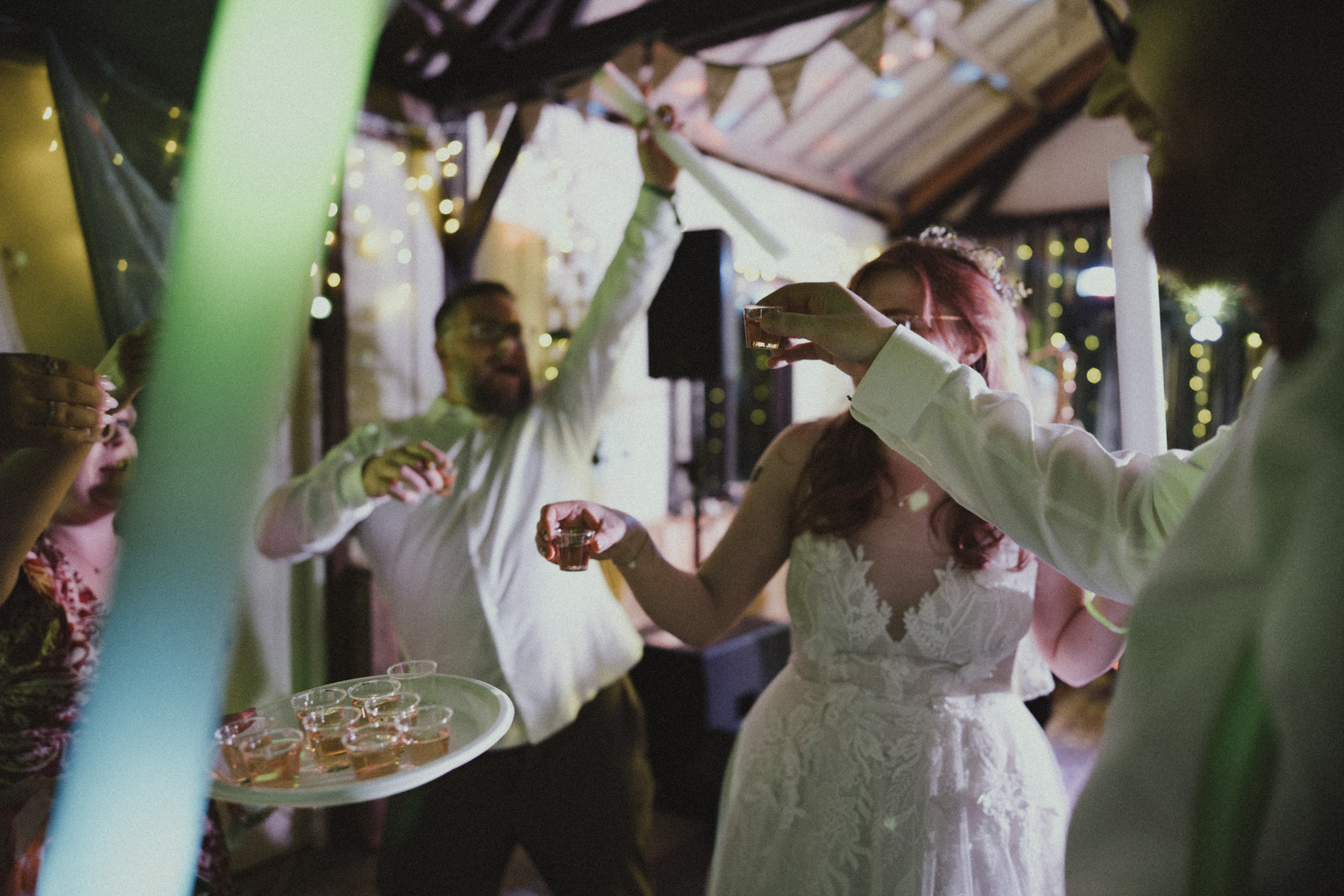 Guests making a toast on the dance floor