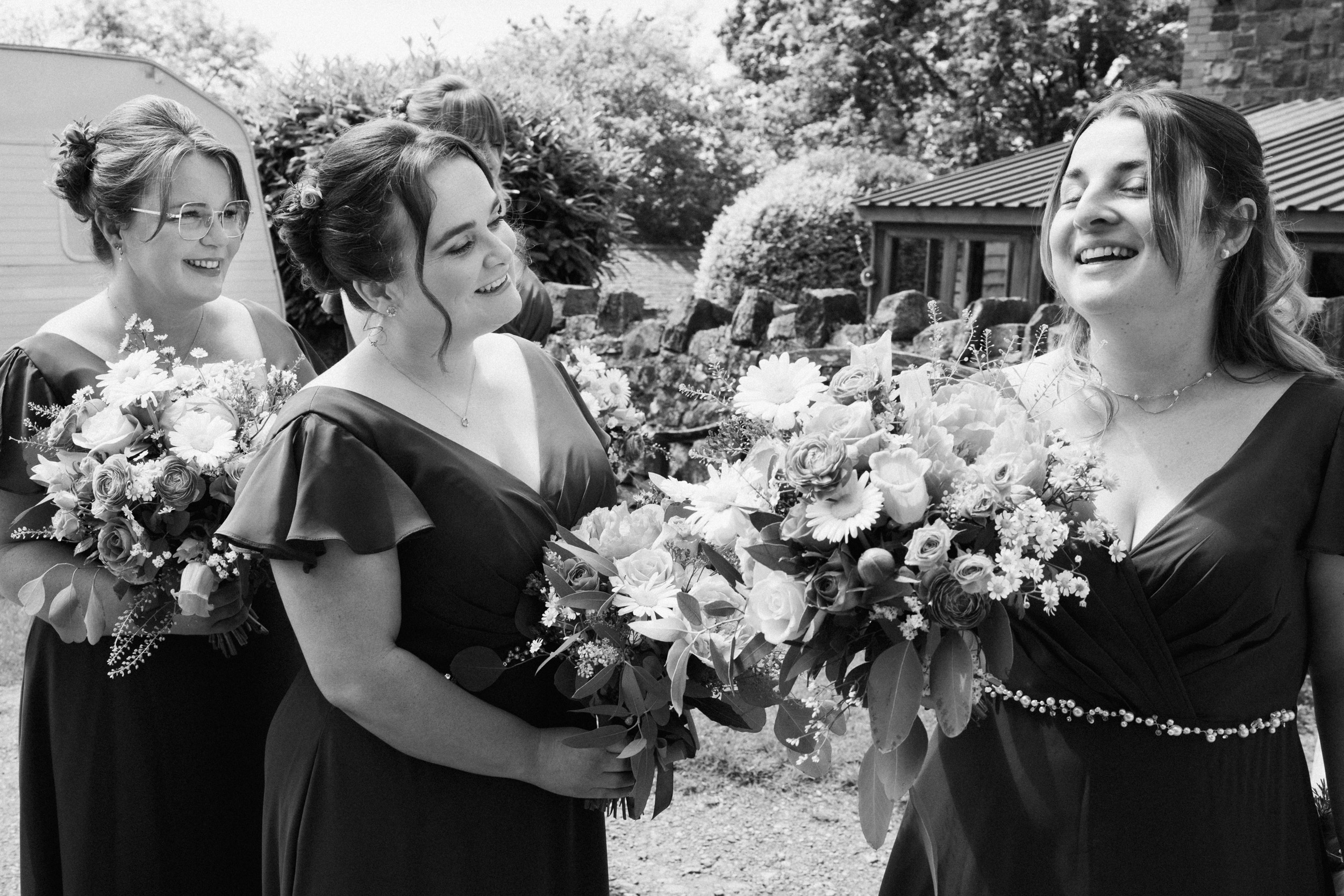 Bridesmaids laughing before the ceremony
