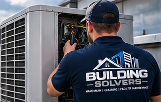 Technician servicing an HVAC unit