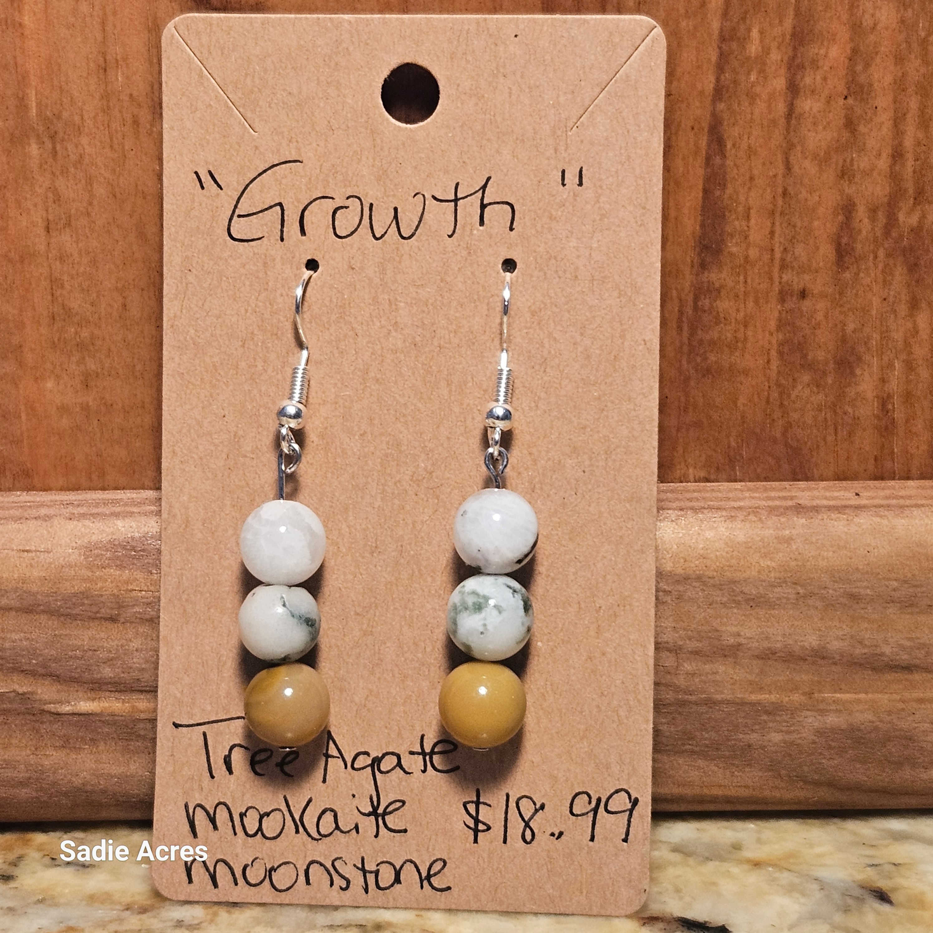 "Growth" earrings with tri-agate and moonstone beads, $18.99