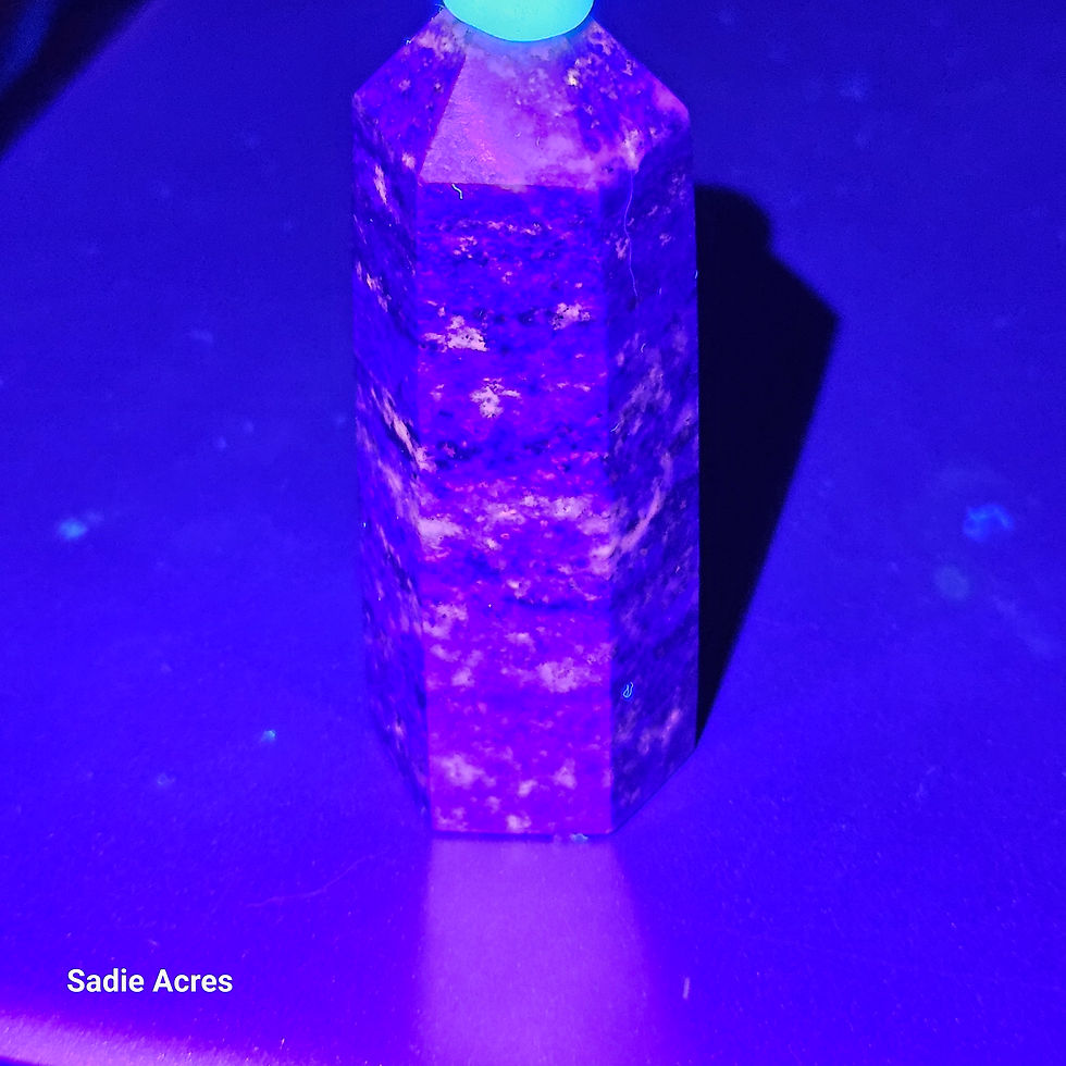 Thumbnail: Sadie Acres crystal tower, purple glow under UV light