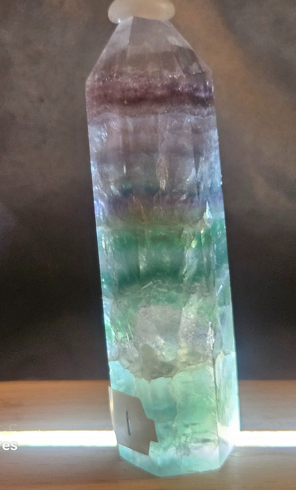 Hand-selected crystal gemstone tower in teal and purple.