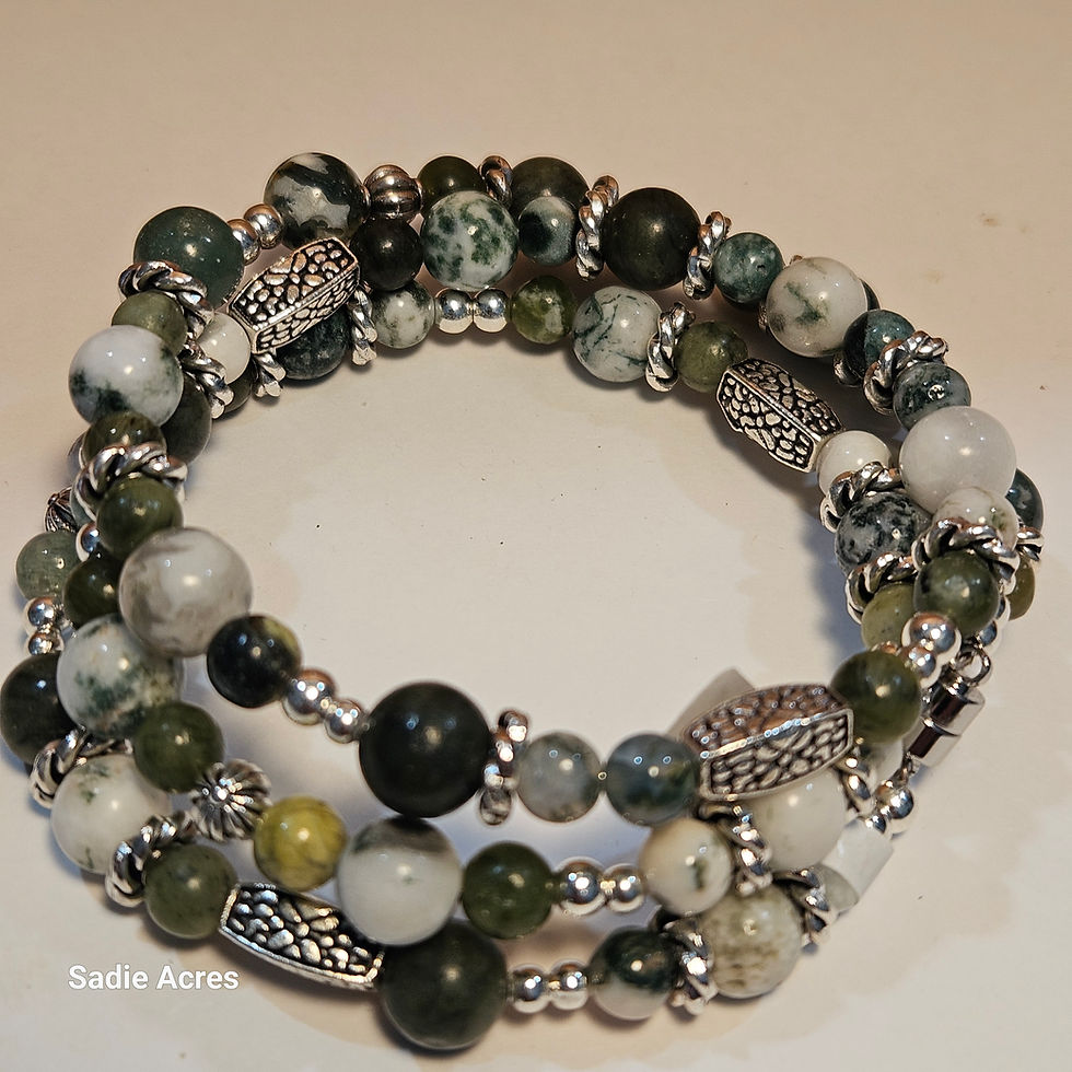 Multi-strand bracelet with green and white stone beads