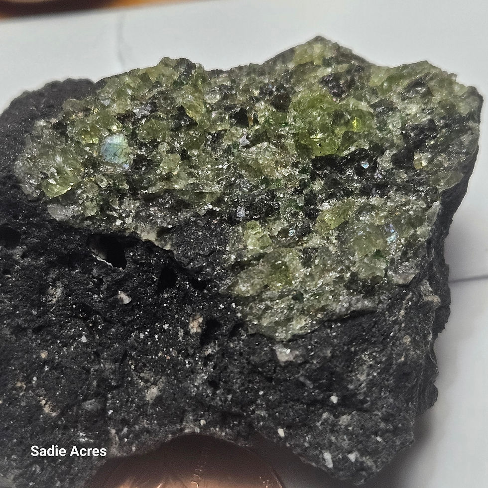 Thumbnail: Green olivine crystal specimen