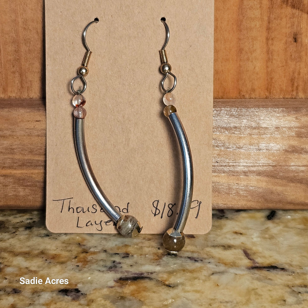 Long curved metallic earrings with beads, 'Thousand Layer' tag