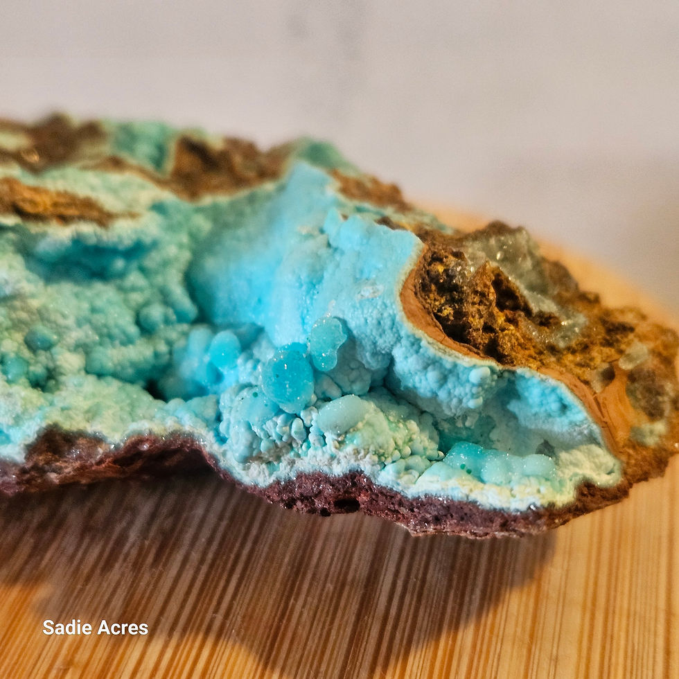 Thumbnail: Blue-green hemimorphite crystal specimen