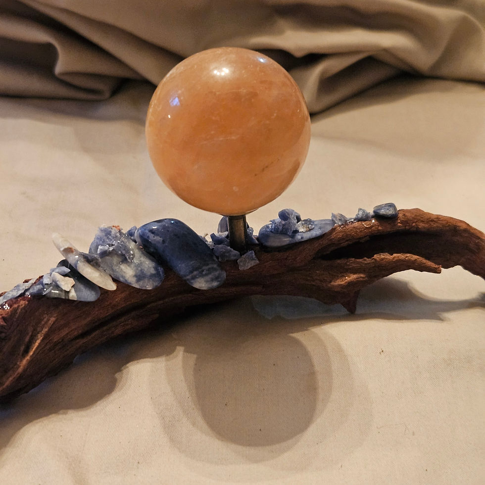 Thumbnail: Sodalite sphere holder with orange crystal