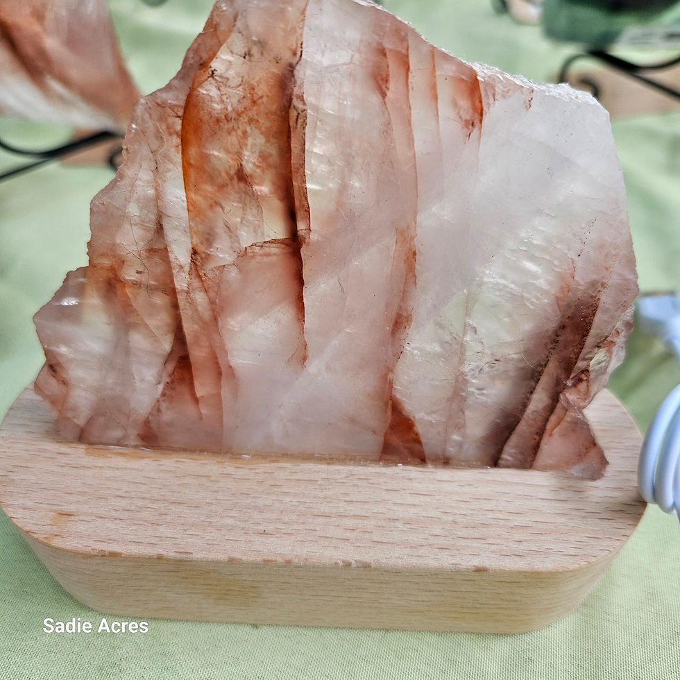 Thumbnail: Rough crystal in wood base from crystal collection