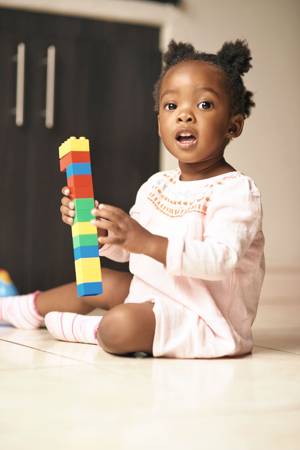 black-child-portrait-little-girl-with-blocks-toys-building-creativity-childhood-developmen