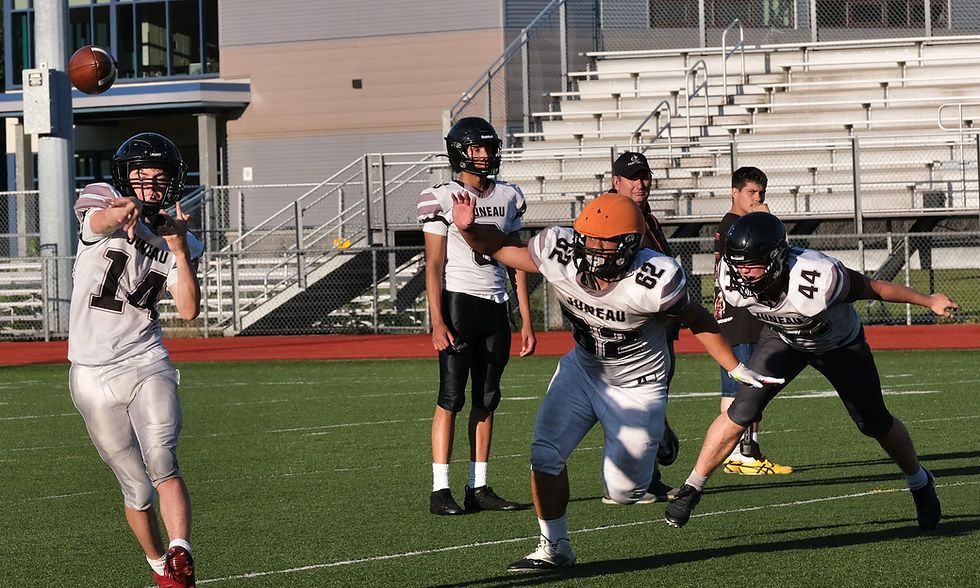 The Juneau-Douglas High School: Yadaa.at Kalé Crimson Bears football team practice Tuesday at the Thunder Mountain Middle School field. The Crimson Bears open their season Aug. 15 in Anchorage against the Service Cougars. (Klas Stolpe / Juneau Independent)