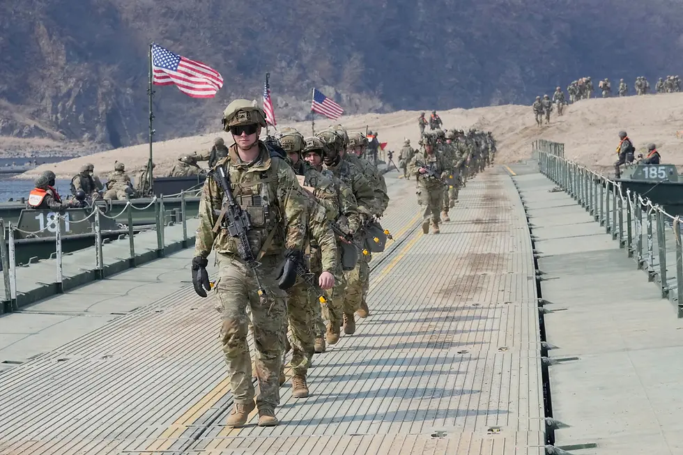 U.S. Army soldiers cross a floating bridge on the Imjin River during a joint river-crossing exercise between South Korea and the United States as a part of the Freedom Shield military exercise in Yeoncheon, South Korea, March 20, 2025. (Ahn Young-joon/Associated Press, file)