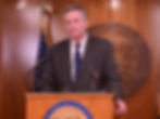 Gov. Mike Dunleavy talks to reporters during a news conference on Monday, May 19, 2025. (Photo by James Brooks/Alaska Beacon)