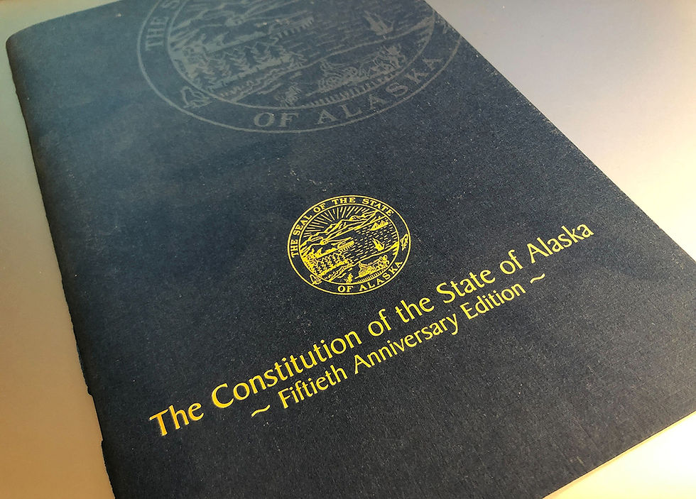 A copy of the Alaska Constitution is seen on Thursday, July 28, 2022. (James Brooks/Alaska Beacon)