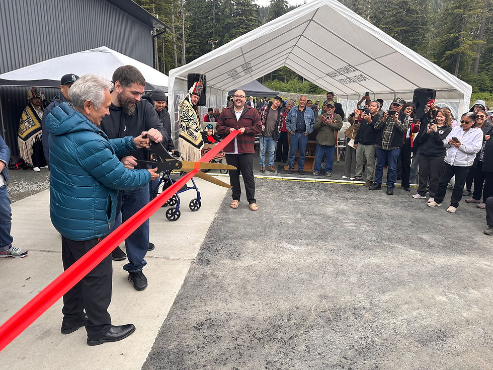 A ribbon cutting to celebrate the opening of the Two Coppers Casino is performed by Edward K. Thomas, left, president emeritus of the Central Council of the Tlingit and Haida Indian Tribes of Alaska, and Travis Woodbury, a member of the family that owns the land the casino is at, on Wednesday, July 1, 2026. (Mark Sabbatini / Juneau Independent)