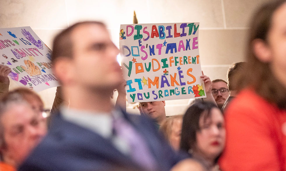 Disability rights advocates rally at the Missouri State Capitol to protest the state’s participation in a lawsuit that began as an effort to block protections for transgender people but ended in a rollback of protections for people with disabilities. Missouri eventually withdrew from the suit, but five Republican-led states did not. (Annelise Hanshaw/Missouri Independent)
