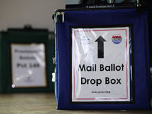 Trump signs order to curb vote-by-mail in bid to control state election laws