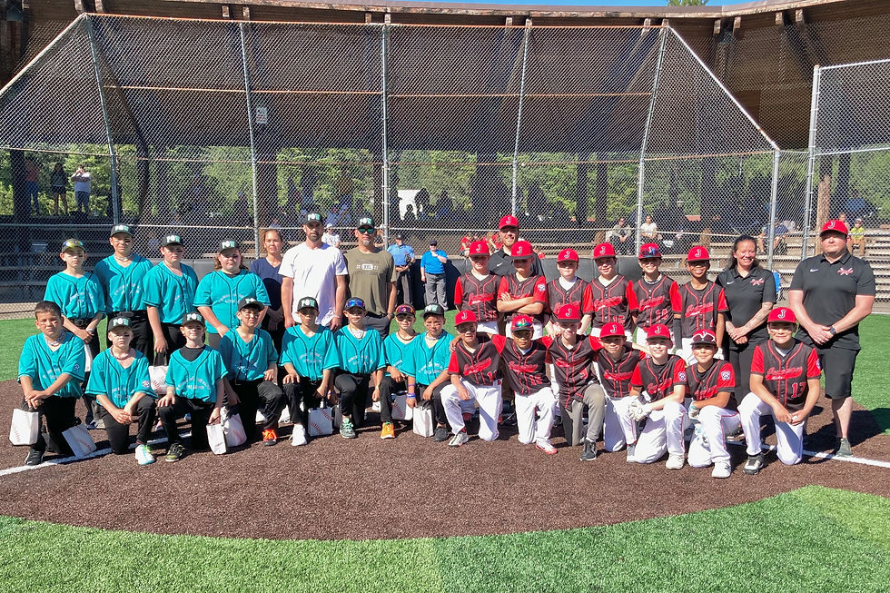 The 10- to 12-year-old All-Stars from Prince of Wales and Juneau posed for a photo before their first game in the Alaska District 2 Majors Tournament on Sunday at Adair-Kennedy Memorial Park. The tournament runs through Saturday. (Klas Stolpe / Juneau Independent)