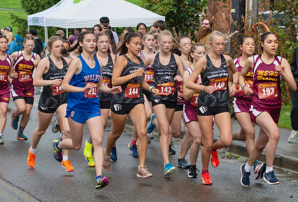 Juneau-Douglas High School: Yadaa.at Kalé girls run at the start of the Region V Cross Country Championships Saturday, Sept. 27, 2025, at Sitka's Totem Park. (James Poulson / Daily Sitka Sentinel)
