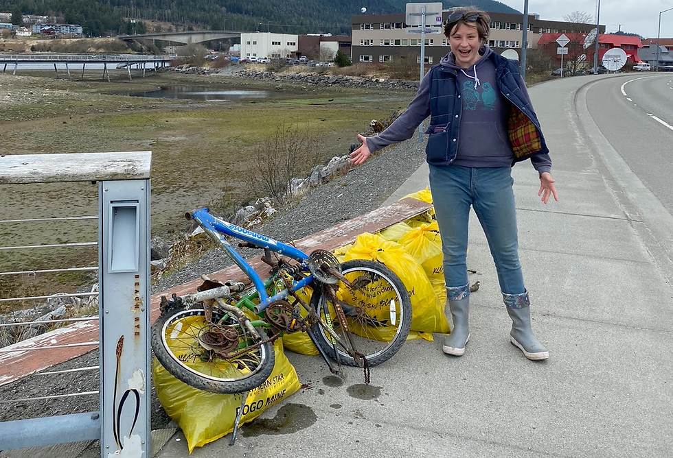 Skylar Bayer retrieved a bike and other debris from the roadside during Litter Free’s 2025 public community cleanup. Yellow bags left by the roadway by 2 p.m. during this year’s cleanup on Saturday, April 18, 2026, will be picked up by volunteer drivers. (Photo courtesy Litter Free Inc.).
