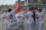 The Juneau-Douglas High School: Yadaa.at Kalé Crimson Bears celebrate winning the Alaska School Activities Association state baseball title with a 5-4 win over Service High School at Anchorage’s Mulcahy Stadium on Saturday, June 6, 2026. (Klas Stolpe / Juneau Independent)