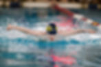 Glacier Swim Club’s Leif Thompson competes in the boys 50-yard butterfly during the First City Invitational at the Gateway Aquatic Center on Saturday, Dec. 13, 2025. (Photo by Christopher Mullen/ Ketchikan Daily News)