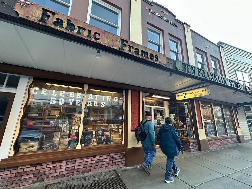 Visitors walk past the Ben Franklin store in downtown Juneau on Saturday, Sept. 13, 2025. (Mark Sabbatini / Juneau Independent)