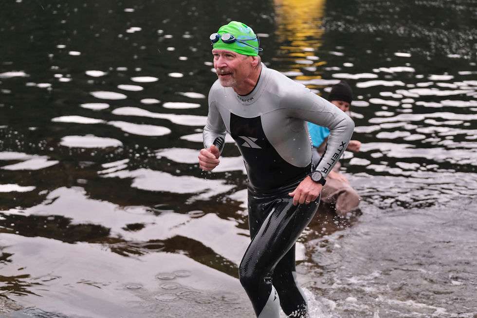 Coleman, Hertberg win the Aukeman long course triathlon