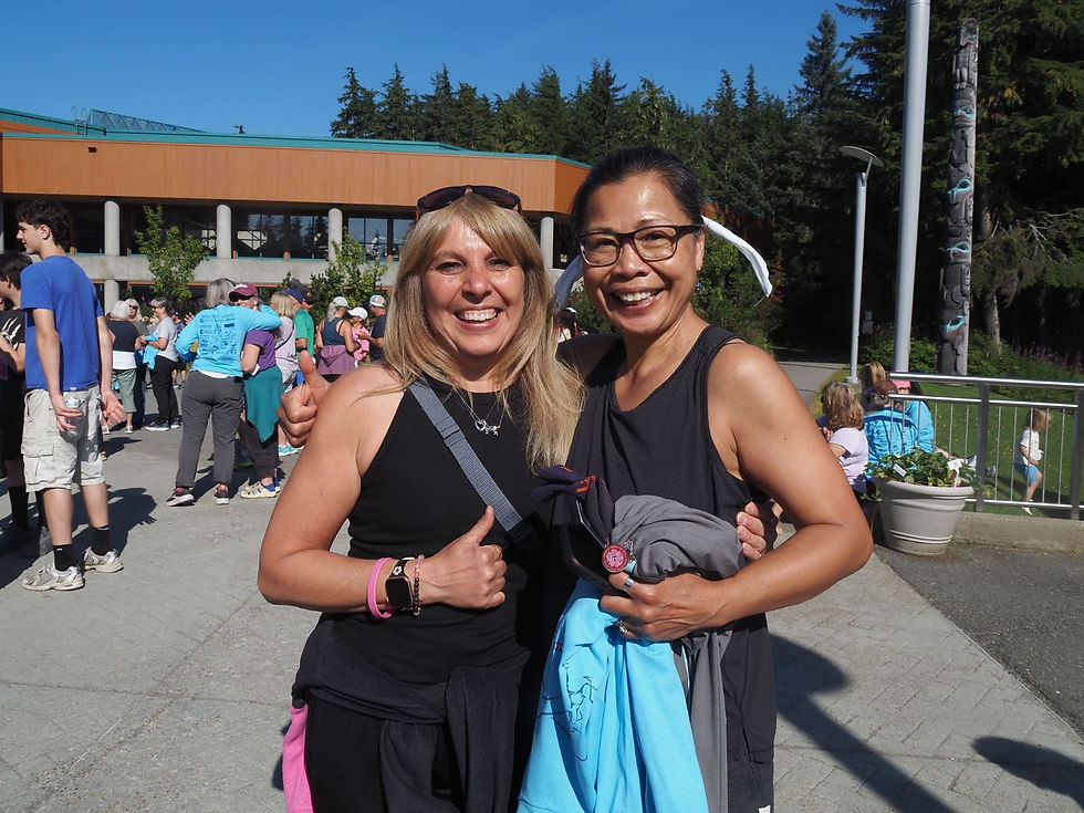 Angela Miller and Rungsri Seehawong smile after completing the Beat the Odds two-mile walk at the University of Alaska Southeast Campus on Aug. 15, 2026. (Natalie Buttner / Juneau Independent)