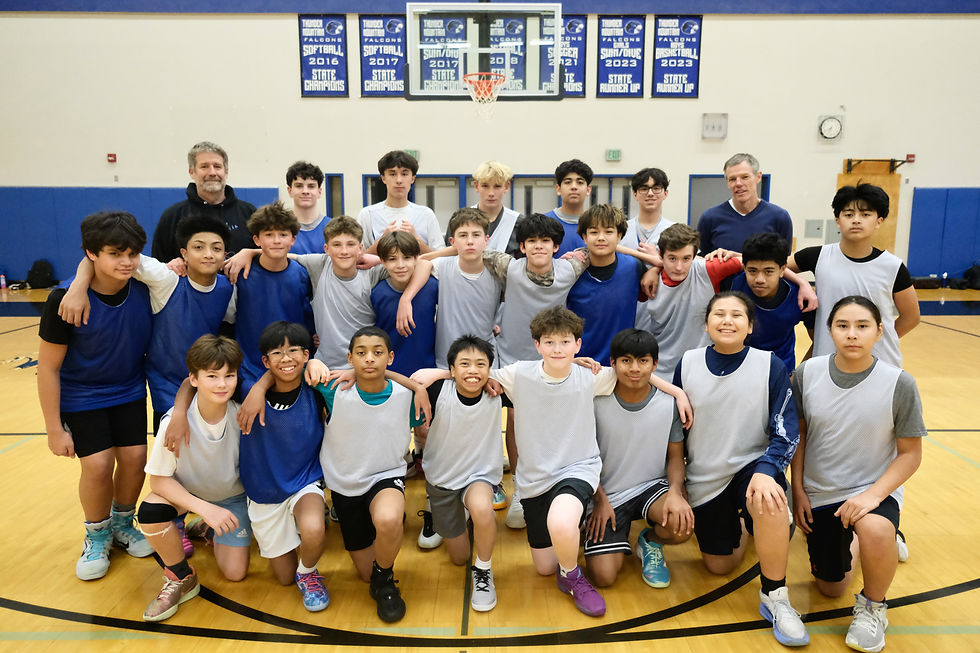 The Thunder Mountain Middle School Falcons boys basketball team pose for a photo at practice Wednesday, Dec. 3, 2025, in the TMMS gymnasium. (Klas Stolpe / Juneau Independent)
