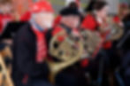 Peter Anderegg plays French horn during a concert by the Juneau Volunteer Marching Band at Sealaska Heritage Plaza on Friday, July 3, 2026. (Mark Sabbatini / Juneau Independent)
