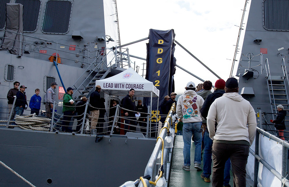 Visitors board the USS Ted Stevens at the Juneau cruise dock for a tour Thursday, Oct. 8, 2026. (Mark Sabbatini / Juneau Independent)